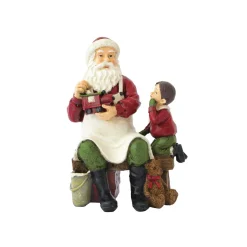 Père Noël avec un enfant CHRISTMAS FIGURINES